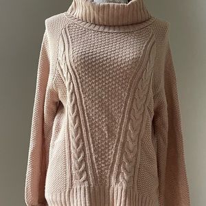 Soft pink patterned turtleneck sweater